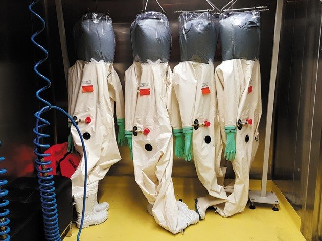 Hazmat suits in a level 4 lab